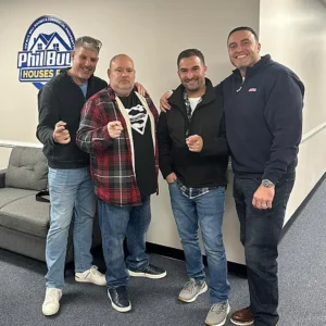 Homebuyer Smiling With Home Sellers